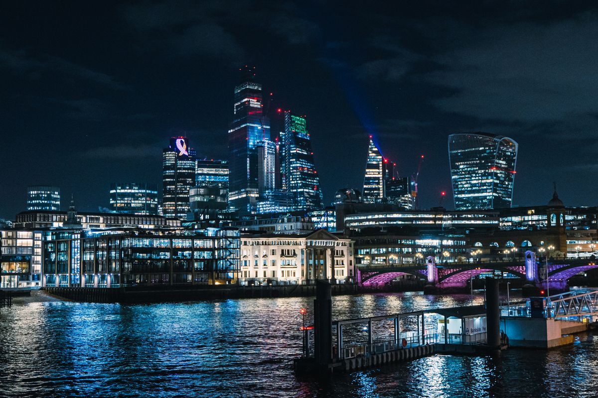 UK city skyline at night showing investment property opportunities in major UK cities including Manchester, Liverpool, Birmingham and Leeds